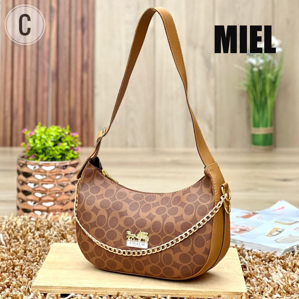 Bolso Coach Media Luna Ref J28